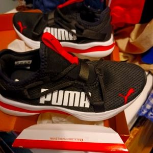 New boys Puma sneakers.